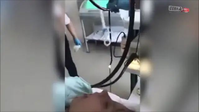 Snake pulled from a woman