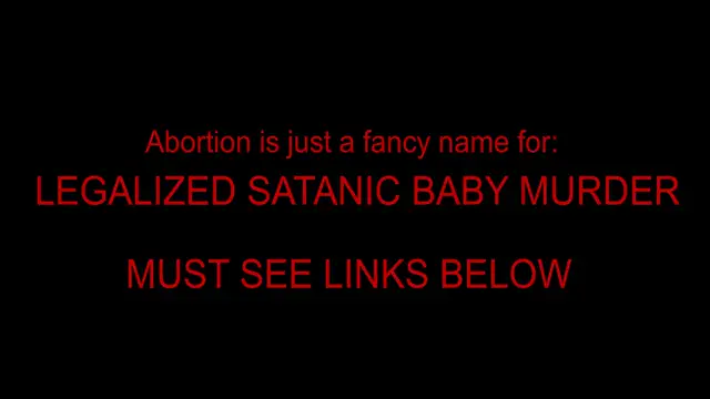 Jill Biden Wearing Satanic Upside Down Cross Pyramid & DEMON HEAD